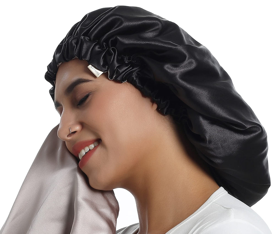 Saymre silk bonnet in black cap protects hair overnight with a smooth feel