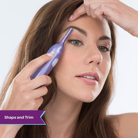 Schick Hydro Silk Perfect Finish Trimmer cleaning brush for quick maintenance.