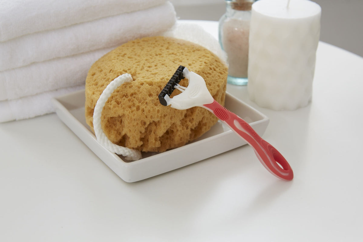 Schick Xtreme3 razor with a shower-hanging hole for quick drying and storage.