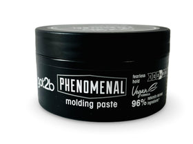 Hands applying Schwarzkopf got2b Phenomenal Moulding Paste for defined texture