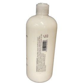 Scottish Fine Soaps Au Lait Hand Lotion close-up shows creamy texture for hands