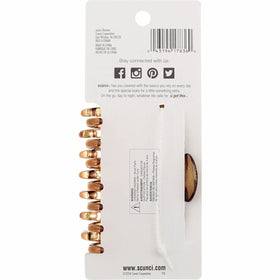 Scunci No Slip Crown Clip in thick hair for updos and back styles.