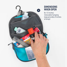Sea to Summit main-compartment with divider neatly organizes toothbrushes and travel-size bottles.