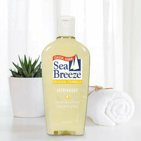 Seabreeze Astringent Original on cotton pad for oil control.