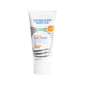 The Seaweed Bath Co. firming cream orange cedar tube hydrates dry skin gently.
