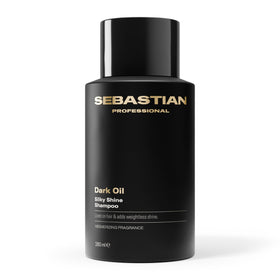 Sebastian Dark Oil Shampoo bottle pour delivers a lightweight cleanse and shine.