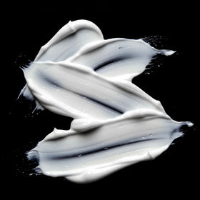 Sebastian Dark Oil Smooth and Shine Mask texture close-up of creamy, nourishing formula.