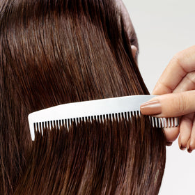 Sebastian Drench on wet hair during rinse demonstrates rinse ready conditioning.