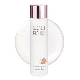 Secret Key Starting Rose Essence Toner bottle close-up showing hydrating glow.