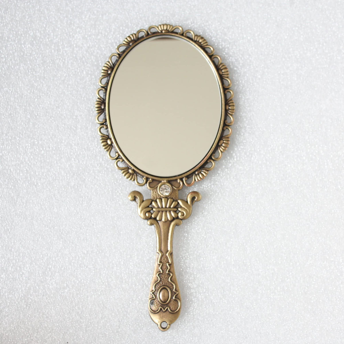 SEHAMANO hand mirror with crystal clear reflection for precise grooming checks.