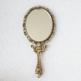 SEHAMANO hand mirror with crystal clear reflection for precise grooming checks.