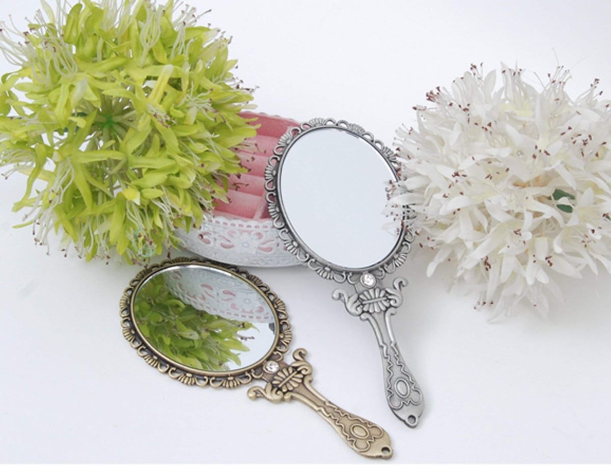 SEHAMANO pocket mirror with embossed rose detail adds elegance to your vanity.