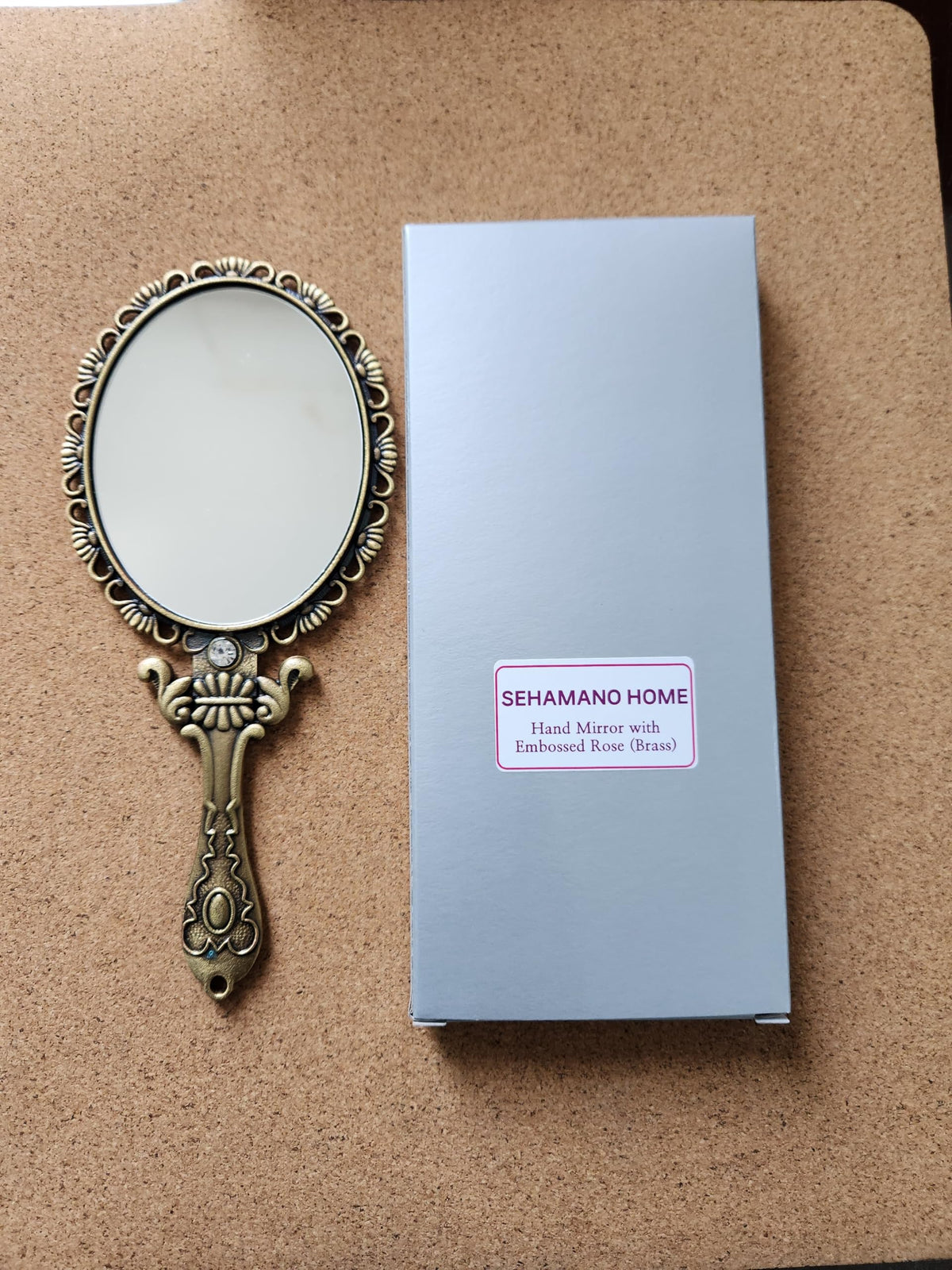 SEHAMANO vintage rose back detail adds classic charm to the mirror.