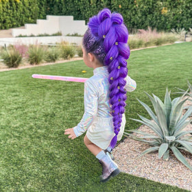 SEIKEA purple ponytail on a child model demonstrates easy kid-friendly styling