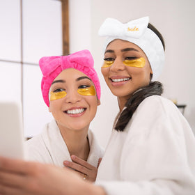 Semato bridesmaid headband hot pink in use during skincare.