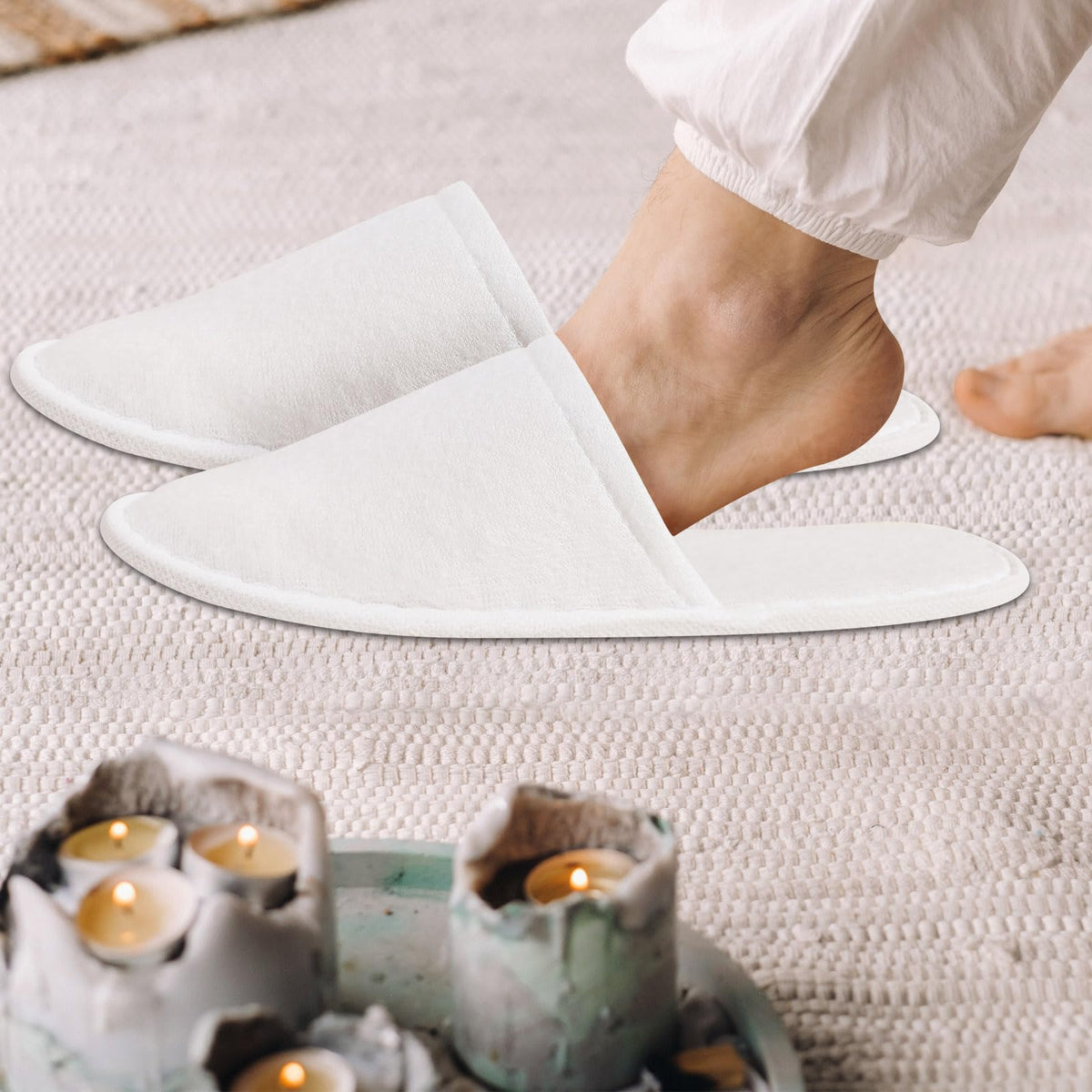 SENJUNSAFE disposable slippers ready for immediate use by guests.