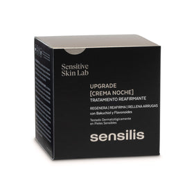 Sensilis Upgrade Night Cream packaging box visible, signaling premium firmness and renewal.