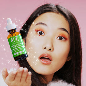 SeoulCeuticals serum dropper close-up showing precise application