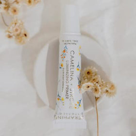 Seraphine Camelina + Strobe primer helps base with a luminous finish.