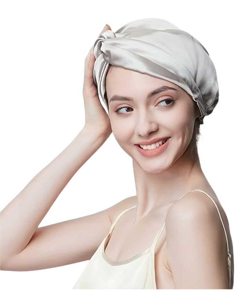 SereLune silk bonnet sleep cap worn at night to minimize friction and tangling.