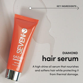 Hair being smoothed with SEVEN Gazar Diamond Serum for frizz control and shine.