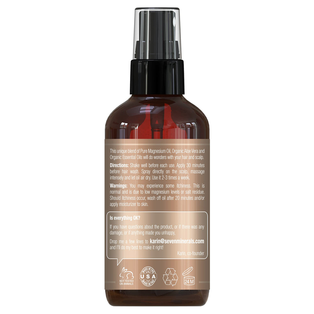 Seven Minerals magnesium spray shown dispensing for convenient daily scalp care.