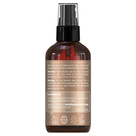 Seven Minerals magnesium spray shown dispensing for convenient daily scalp care.