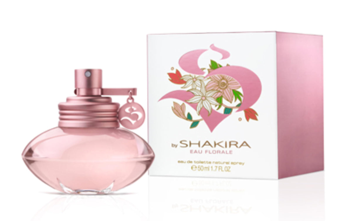 Close-up of Shakira Eau Florale bottle highlights delicate blooms and modern design