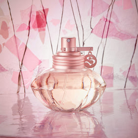 Spray action image demonstrates easy, even application of Shakira Eau Florale