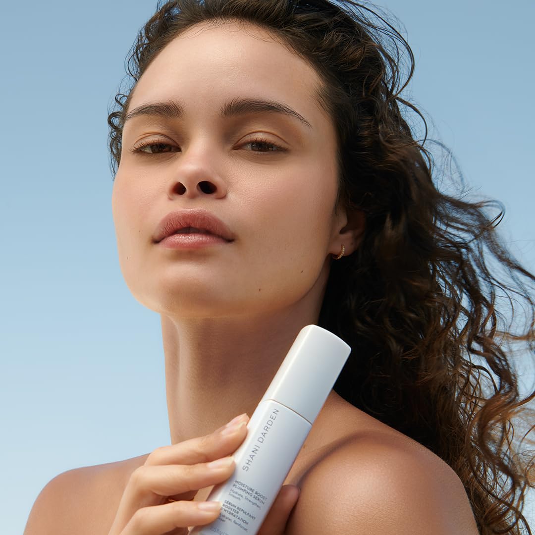 SHANI DARDEN Morning routine application scene shows layering with sunscreen