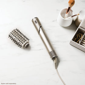 Shark XSKHD4PBA paddle brush includes attachment for easy use.