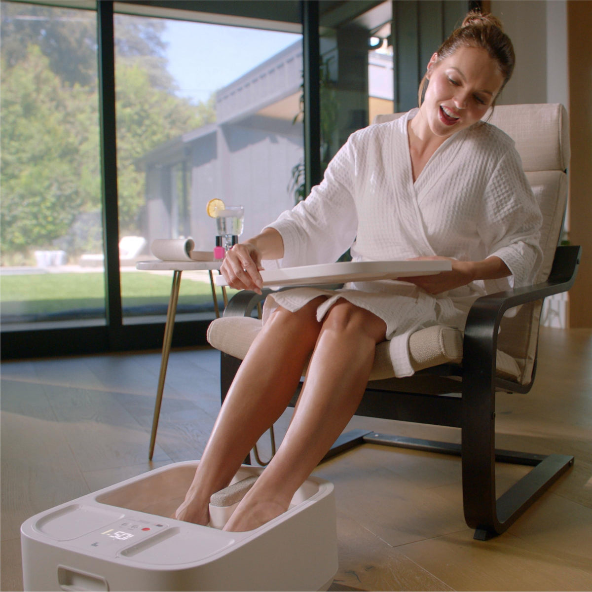 Sharper Image feet scrubber aids cleansing during soak