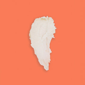 Shea Radiance Creamy texture closeup emphasizes smooth consistency.