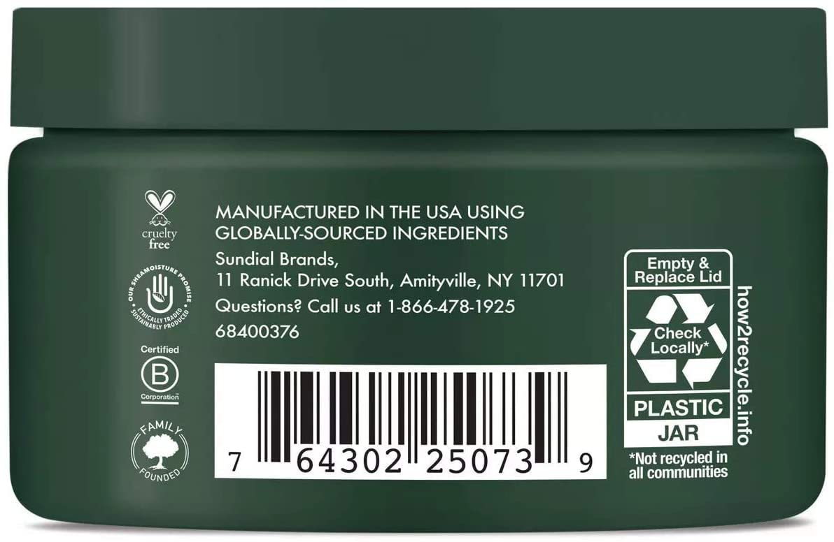 Label detail reveals organic Fair Trade shea butter and essential oils.