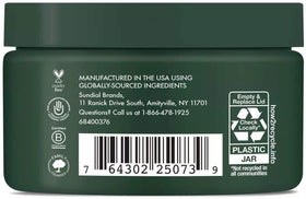 Label detail reveals organic Fair Trade shea butter and essential oils.
