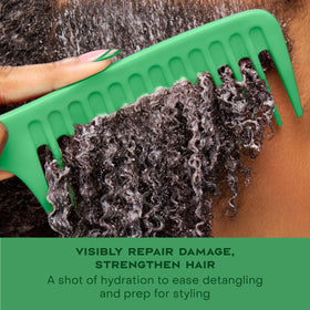 Close-up of Sheamoisture Bond Repair Shampoo pouring, controlled cleansing.