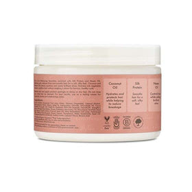 Shea Moisture Curl Enhancing Smoothie being applied to damp hair for easy styling