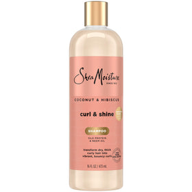 SheaMoisture Coconut & Hibiscus shampoo bottle demonstrates frizz control for defined curls