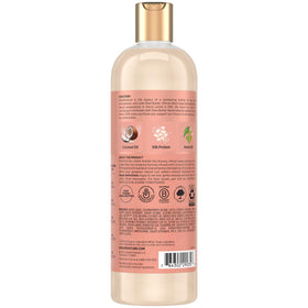 Close-up of the label highlighting organic ingredients and shine on Sheamoisture shampoo