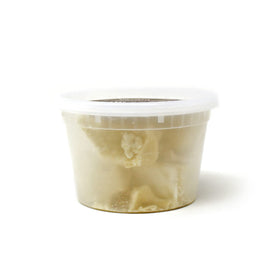 Sheanefit cocoa butter texture closeup highlights unrefined quality and creamy feel.