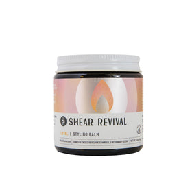 Shear Revival Loyal Styling Balm bottle close-up showing premium packaging and light hold.