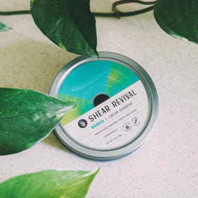 Shear Revival Wonder Shampoo travel tin packaging for on-the-go grooming.