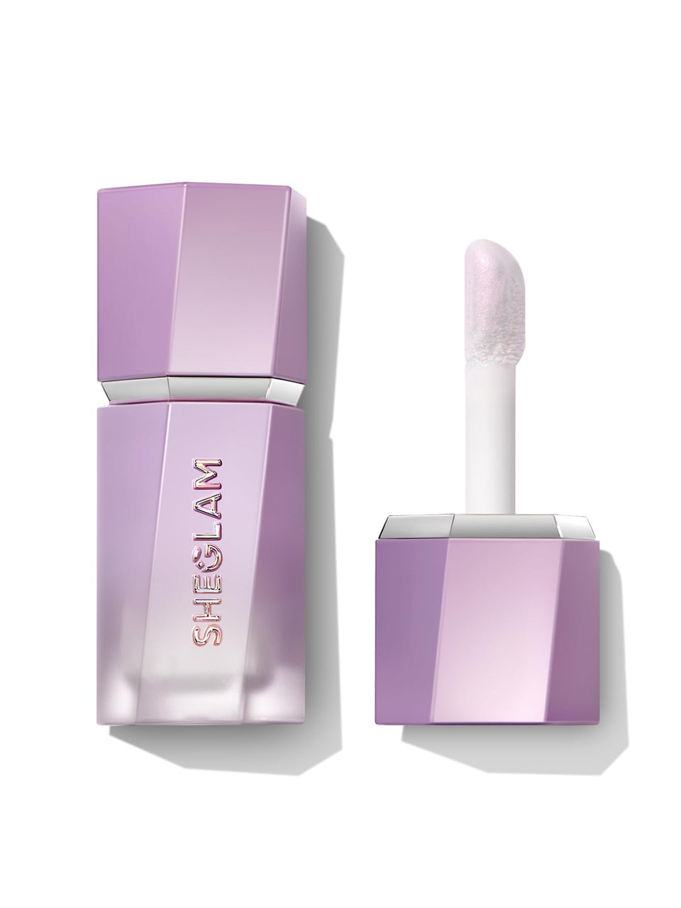 SHEGLAM Chroma-Glow Bloom bottle closeup highlights pearlescent shimmer for radiant skin