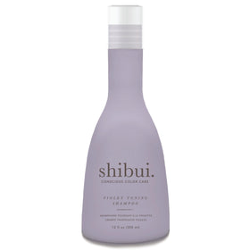 SHIBUI Violet Toning Shampoo bottle on a counter, highlighting brassiness neutralization.