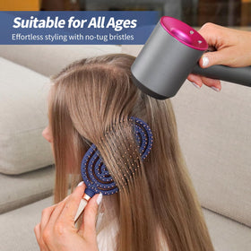 SHINLEA curved brush with massage bristles promotes scalp comfort.