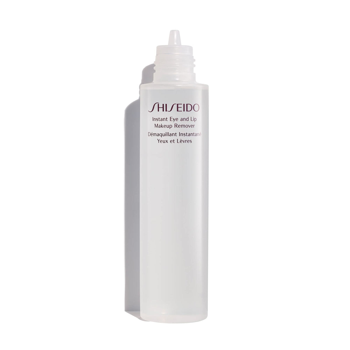 Shiseido Instant Eye & Lip Remover on cotton pad, lifts long-wearing makeup gently.