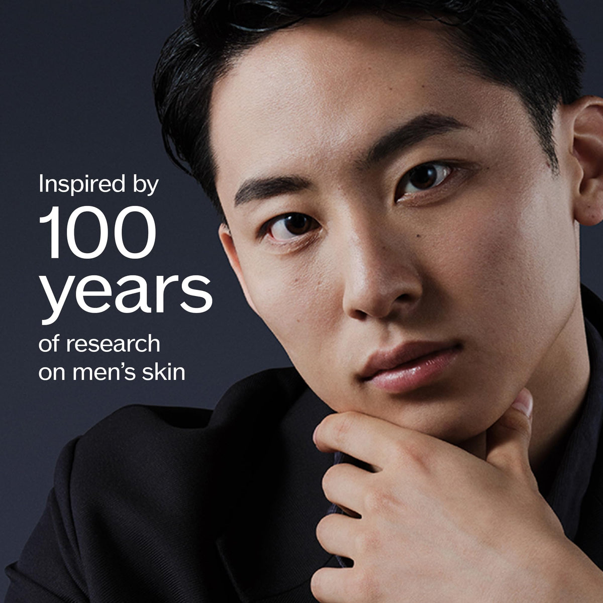 Shiseido Men Ultimune Serum during face application, smooths evenly for preparation.