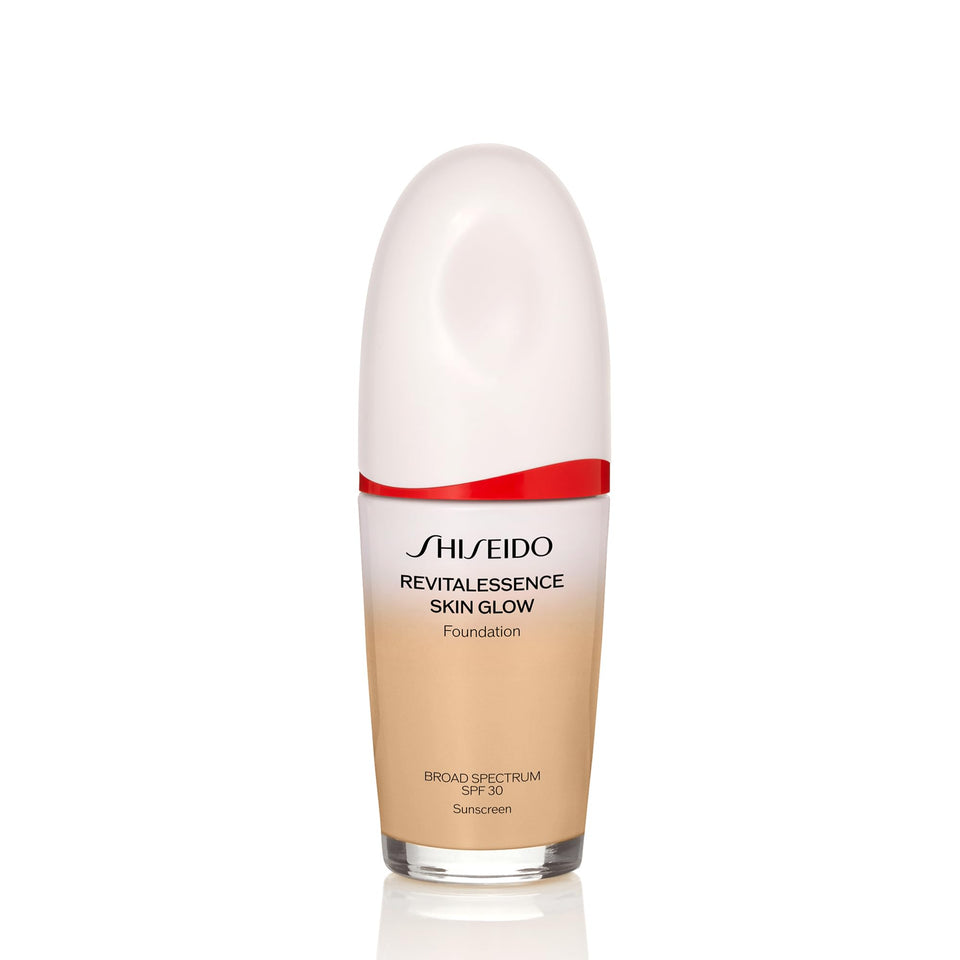 Shiseido Revitalessence bottle showing dewy foundation finish for radiant skin