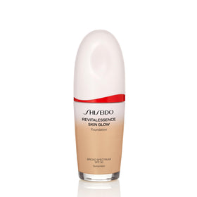 Shiseido RevitalEssence bottle-pour for seamless glow.