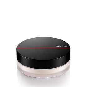 Shiseido Synchro Skin Invisible Silk Powder packaging close-up for matte, portable use